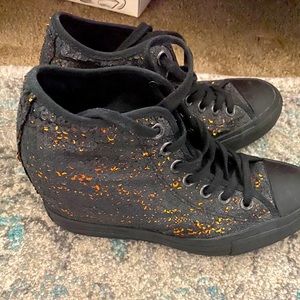 Black - sequined Converse shoes.